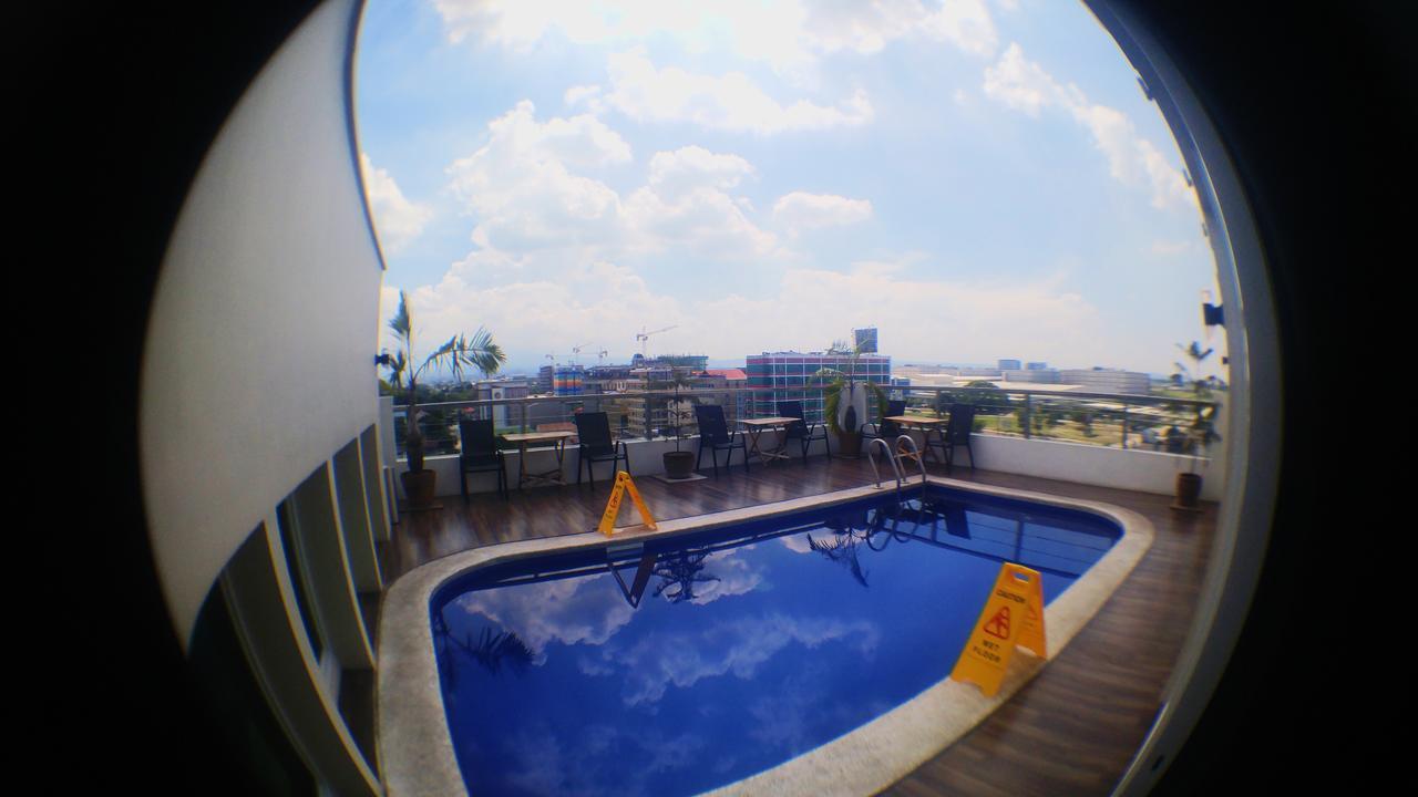 Dalian Peak Hotel Angeles Bagian luar foto